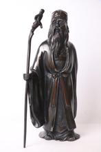 Een zorgvuldig vervaardigd bronzen standbeeld van Jurojin -