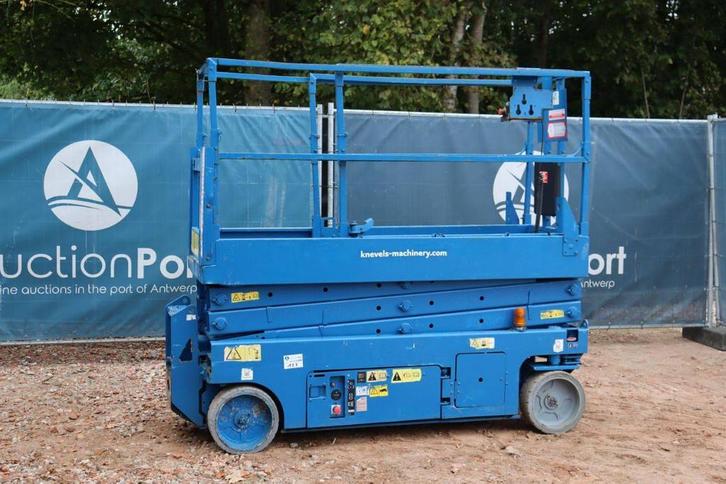 Veiling: Schaarlift Genie GS-2032 Elektrisch 7.9m 2007, Zakelijke goederen, Machines en Bouw | Liften, Steigers en Ladders, Ophalen