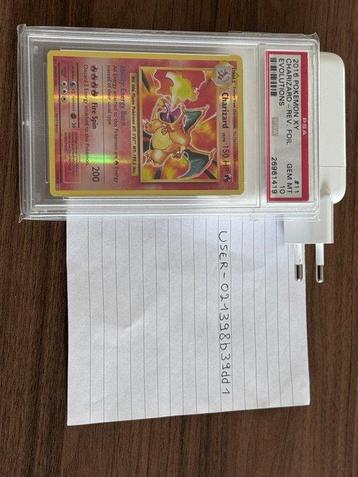 Pokémon - 1 Graded card - Dracaufeu 11 Première édition -