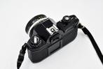 Nikon EM + 50mm f18 Analoge camera, Audio, Tv en Foto, Nieuw