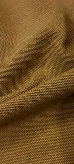Stof met een dikke geweven structuur, canvas in tabak- en
