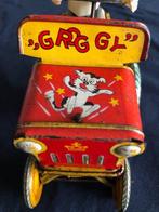 E.T.GR - Groggy - Gekke wind-up auto met celluloidfiguur,, Antiek en Kunst