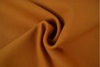 10 meter canvas stof - donker okergeel - Katoenen stof, Hobby en Vrije tijd, Verzenden, 120 cm of meer, Geel, Polyester
