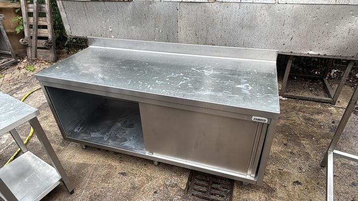 Solide RVS werktafel met schuifd. 180x70x90/95 bxdxh cm, Zakelijke goederen, Horeca | Keukenapparatuur, Ophalen of Verzenden