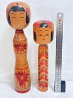 Paire de poupées Kokeshi traditionnelles de Tokio Takase