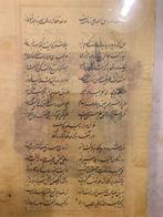 Man in een jas met bontkraag, Iran, begin 20e eeuw -