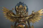 This is a bronze 30 cm tall statue of the Garuda - Brons -