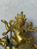 Mahakala, animal de fable. - Bronze doré - Tibet - Fin du
