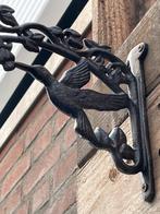 Decoratief ornament (2) - Set van twee gietijzeren