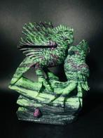 Paired natural ruby zoisite with hand-crafted parrot