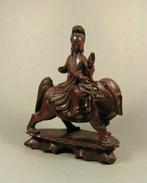 A well-carved wooden sculpture of Guanyin seated on a, Antiek en Kunst
