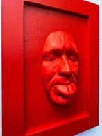 Small red mockery on red background-red frame
