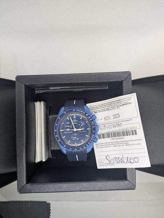 Swatch - MoonSwatch - Mission to Neptune - Sans prix de, Handtassen en Accessoires, Horloges | Heren