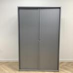 Tweedehands Mibra roldeurkast (hxbxd) 195x125x50 cm , grijs, Huis en Inrichting, Kasten | Roldeurkasten en Archiefkasten, Gebruikt