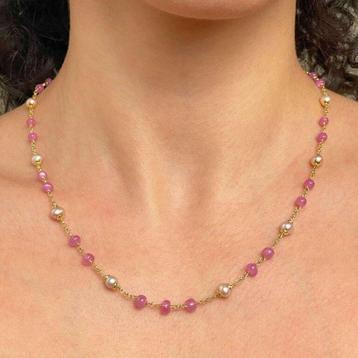 Collier de rubis avec présence dasterisme en rondelle,