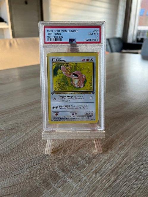 Pokémon Graded card - LICKITUNG 1ST EDITION JUNGLE - PSA, Hobby en Vrije tijd, Verzamelkaartspellen | Pokémon