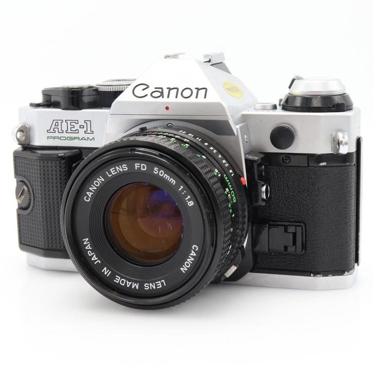 Canon AE-1 Program zilver + FD 50mm F/1.8 | Tweedehands, Audio, Tv en Foto, Foto | Lenzen en Objectieven, Zo goed als nieuw, Verzenden
