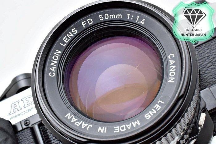 Canon AE-1 Program Silver + NFD 50mm F1.4 Single lens reflex, Audio, Tv en Foto, Fotocamera's Analoog