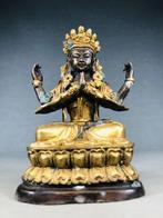 The Four-Armed Avalokiteshvara, a distinguishing figure in