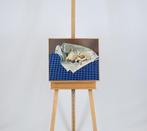 Frans Clement (1941) - Stilleven met haantjes op een krant