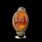 Sasanian Brons Ring met carneool diepdruk met mannelijke