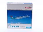 Schaal 1:500 Herpa 510097 Luxair Bombardier Dash  8-Q400..., Ophalen of Verzenden, Zo goed als nieuw