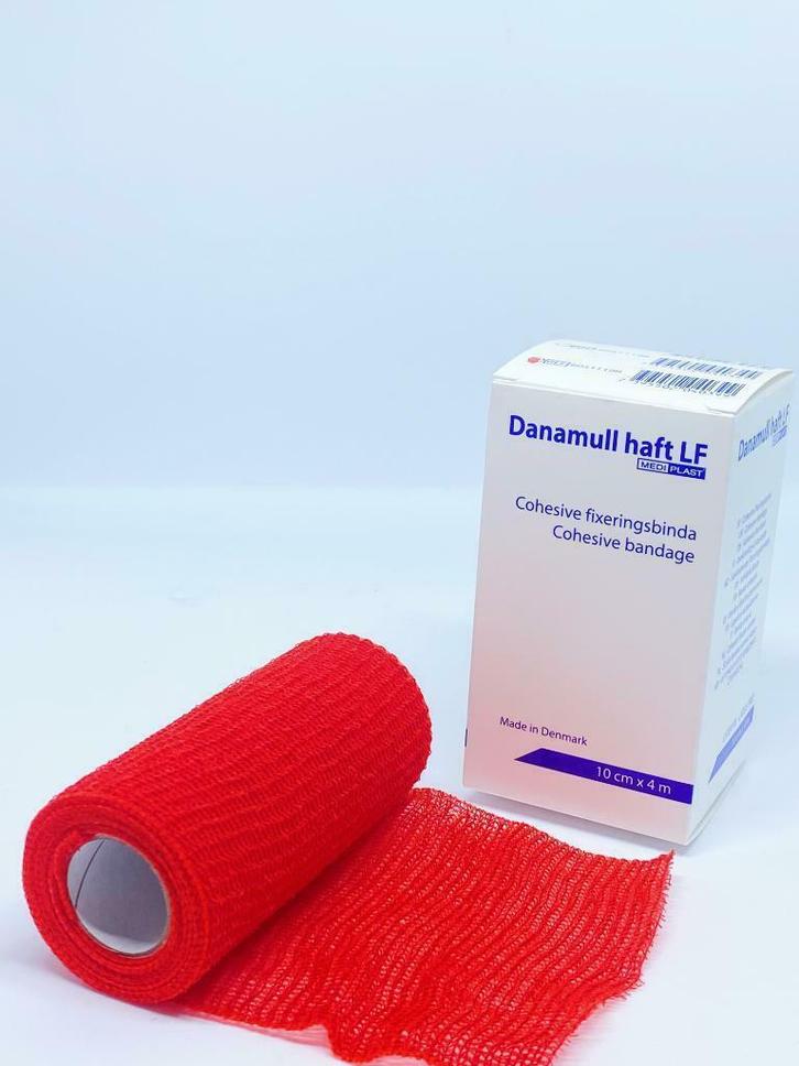 Danamull Haft Zelfklevend Fixatiewindsel Rood 10cm x 4m, Diversen, Verpleegmiddelen, Nieuw, Ophalen of Verzenden