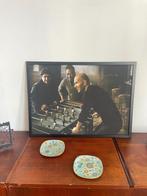 frame van de iconische Louis Vuitton-foto van Café, Collections