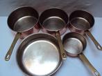 4 casseroles et 1 sauteuse cuivre et acier inoxydable -