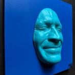 gregos - Blue light smile on blue background