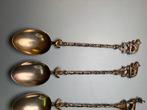 Lepel (11) - Partij lepels en een zilveren tang van 800 met