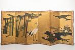 Een zesdelig vouwscherm met bladgoud en kraanvogels, pioenen