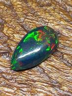 Ethiopische zwarte opaal cabochon. 3,20 karaat. Geen