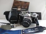 Olympus OM-1n reflexcamera met Olympus 50mm F/1.8 lens, Audio, Tv en Foto, Fotocamera's Analoog, Nieuw
