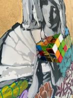 Quiona+ - Virgin Plays with a Real Rubiks Cube (Rubik’s