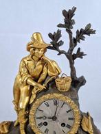 Horloge de cheminée avec personnage - - Bronze doré -, Antiek en Kunst