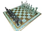 Large chess set in patinated bronze modelled after Etruscan