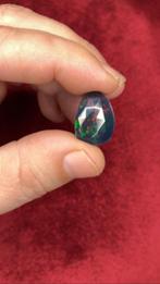 Opaal Negro de fuego facetado 4,55 Ct- 0.9 g