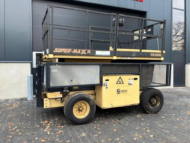 Veiling: Schaarlift Grove SM4688E Elektrisch 14m 1996, Zakelijke goederen, Machines en Bouw | Liften, Steigers en Ladders, Ophalen
