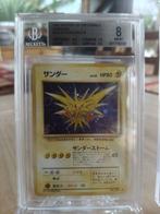 2 Graded card - Dark Gyarados & Zapdos Holo – Team Rocket, Hobby en Vrije tijd, Verzamelkaartspellen | Pokémon, Nieuw