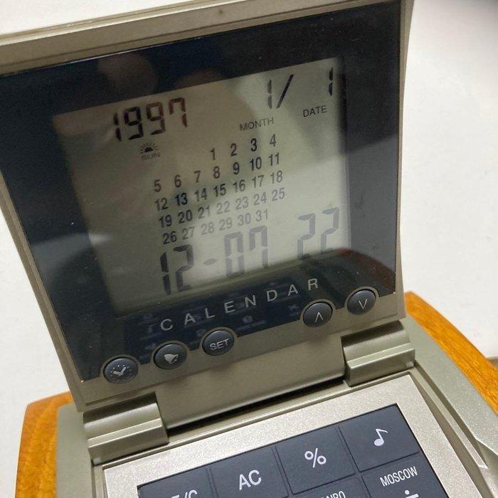 Rekenmachine - 1990-2000 - Vintage wereldtijdklok calculator, Games en Spelcomputers, Spelcomputers | Overige Accessoires