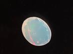 White Opal - play of color - 0.66 ct - seller certified, Verzenden