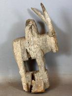 AloAlo Zebu head sculpture, fragment of funerary stele of
