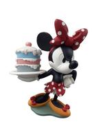 Disneys Minnie Mouse preparing to throw a cake - Disney -, Collections