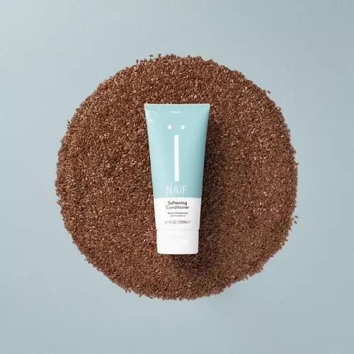 Naïf Hair Softening Conditioner, Handtassen en Accessoires, Uiterlijk | Haarverzorging, Nieuw, Verzenden