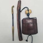 Traditionele Japanse kiseru-rokerset met gebeeldhouwde