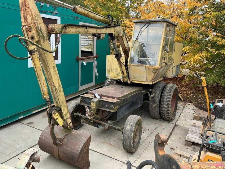 Online veiling - Banden graafmachine, Zakelijke goederen, Machines en Bouw | Kranen en Graafmachines, Ophalen