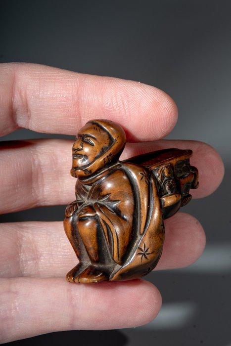 Un netsuke en buis japonais représentant un danseur de, Antiquités & Art, Antiquités | Autres Antiquités