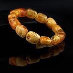 Butterscotch Amber Armband – Gepolijste fossiele kralen uit