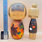 Twee vintage Kokeshi, gesigneerd door Kawase Yuji & Usaburo